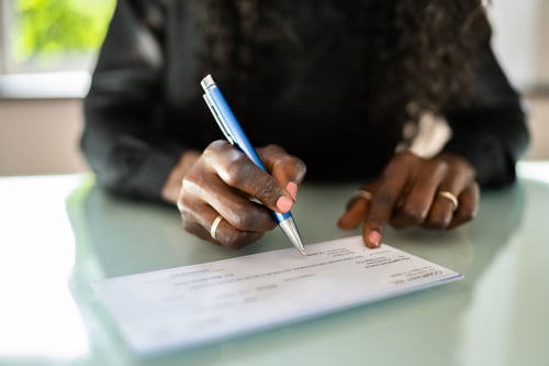 Charitable Donor writing a check