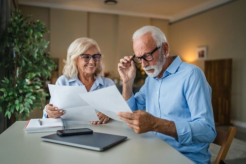 couple looking at paperwork