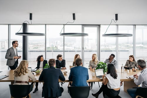 business meeting in a large modern conference room